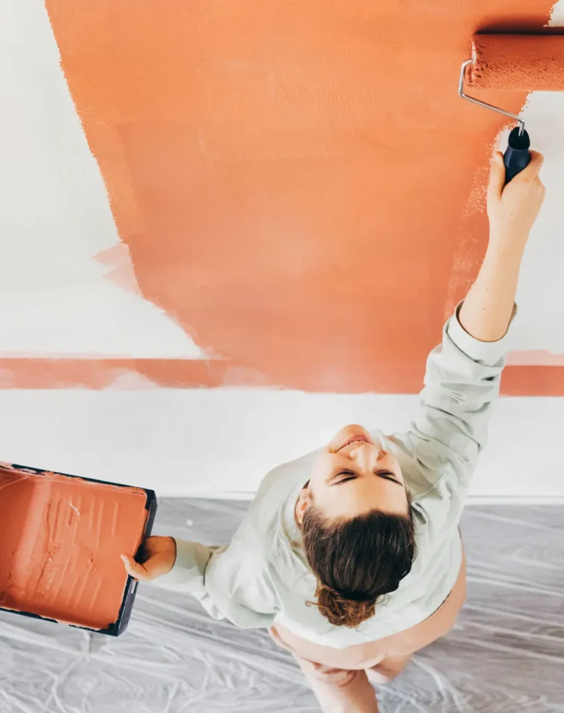 woman-with-paint-roller-painting